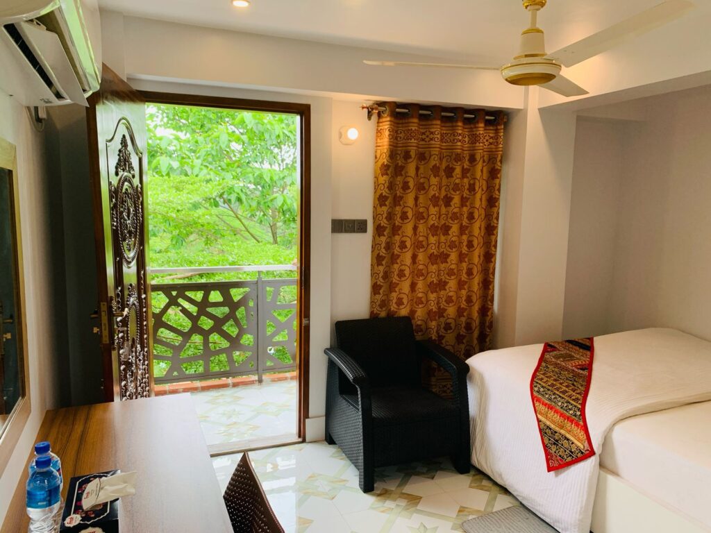 Purbachal Nijhum Polli Resort Cottage Belconi side Room